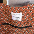 Doublure intérieure bordeaux à motifs dorés du cabas Canigou, unique à chaque pièce